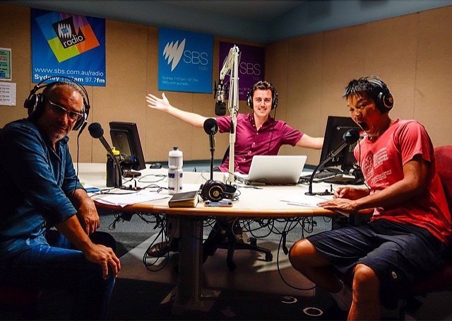Alex hosting a podcast at SBS.